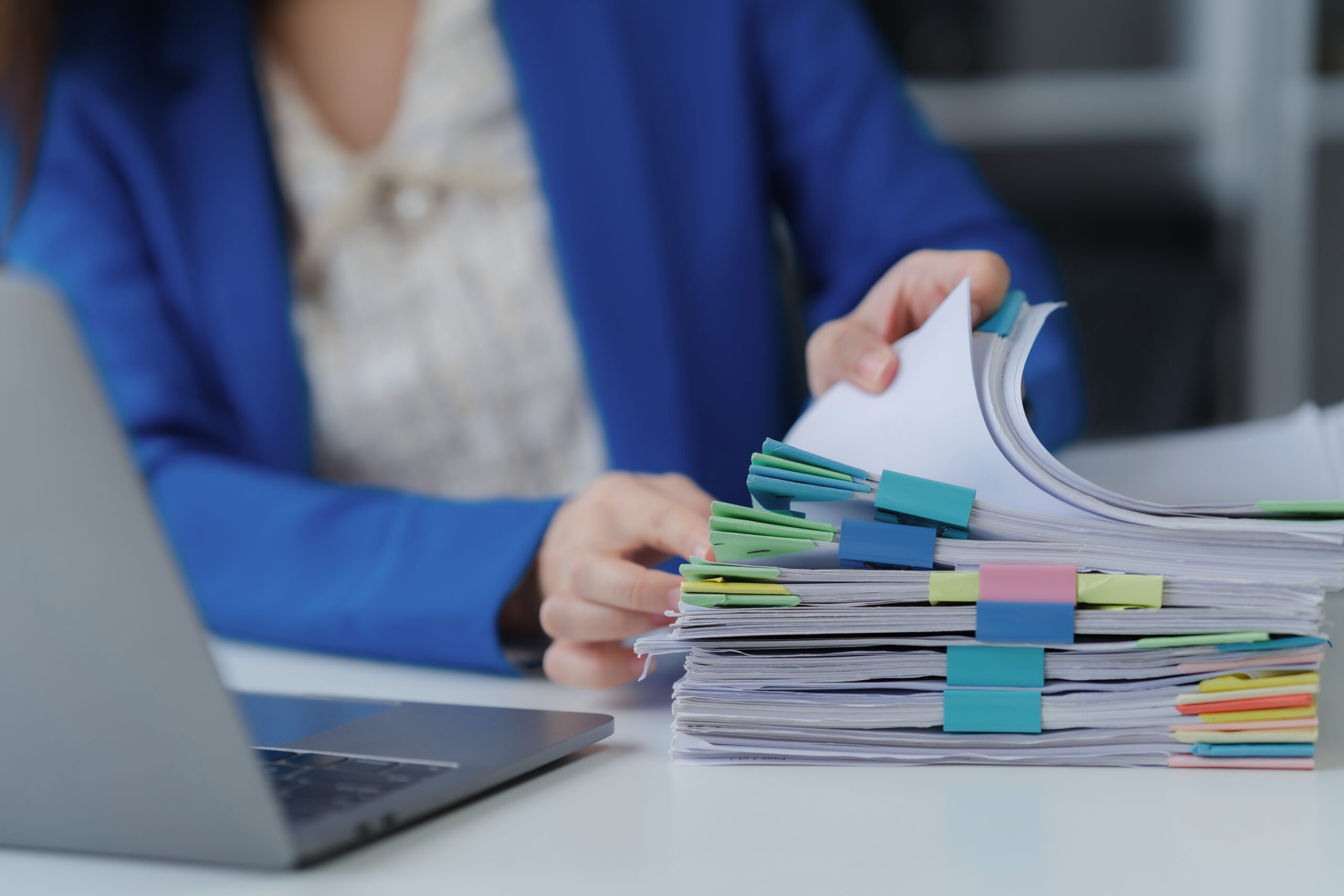 Women sorting through files
