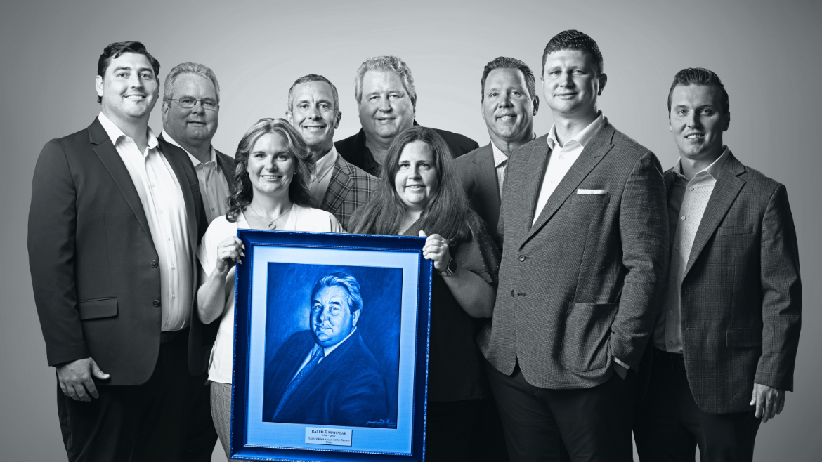 Mahalak Family with fathers portrait of the family business.